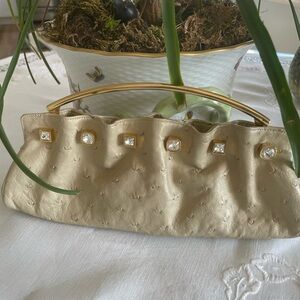 Judith Leiber Gold Clutch with Crystal Accents
11”L 4” h 2” w